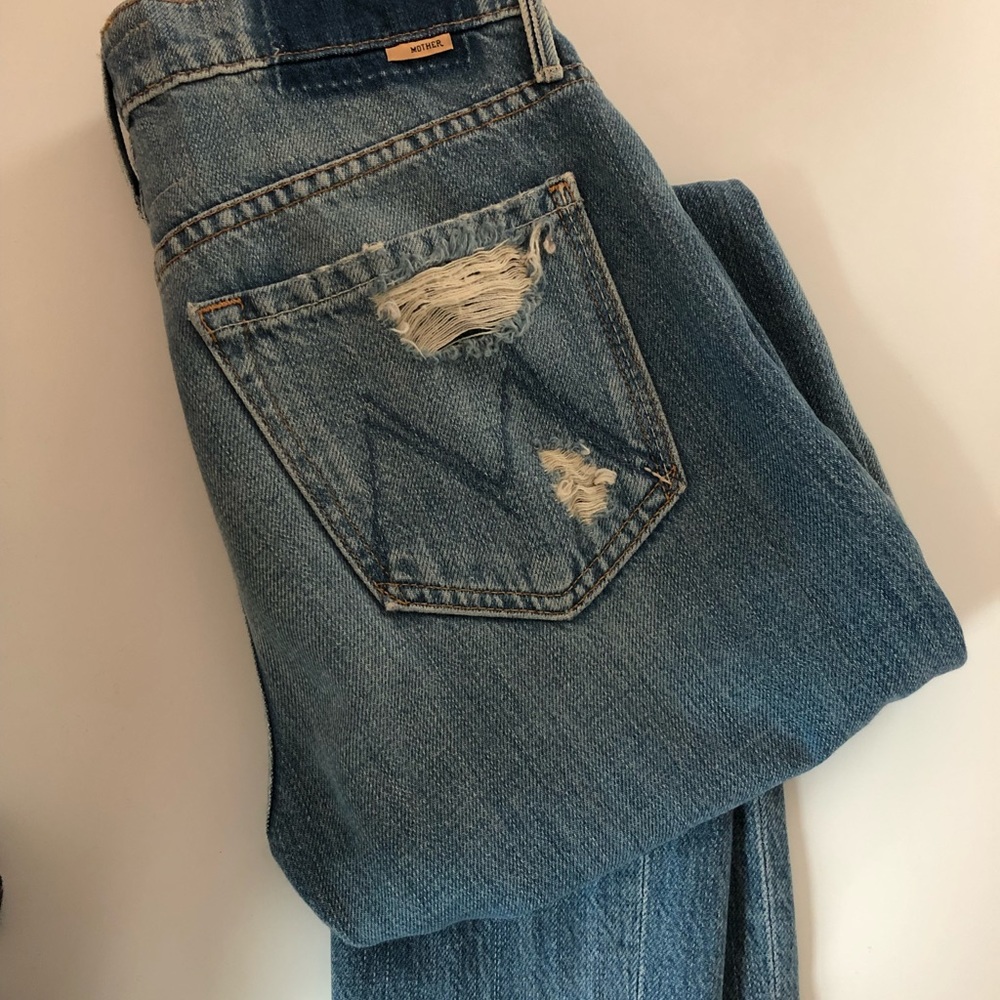 MOTHER Denim high waisted ripped jeans.